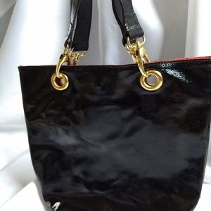 Small black Maurizio Taiuti purse